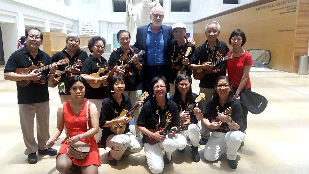 Tim: "A highlight of my Singapore trip, got to meet and perform a song with Dick Yip & the Minstrels, a crazy elder ukelele and singing group - when Dick found out I was from California, he grabbed me and we did 'California Dreaming' together in the rotunda of the National Gallery."